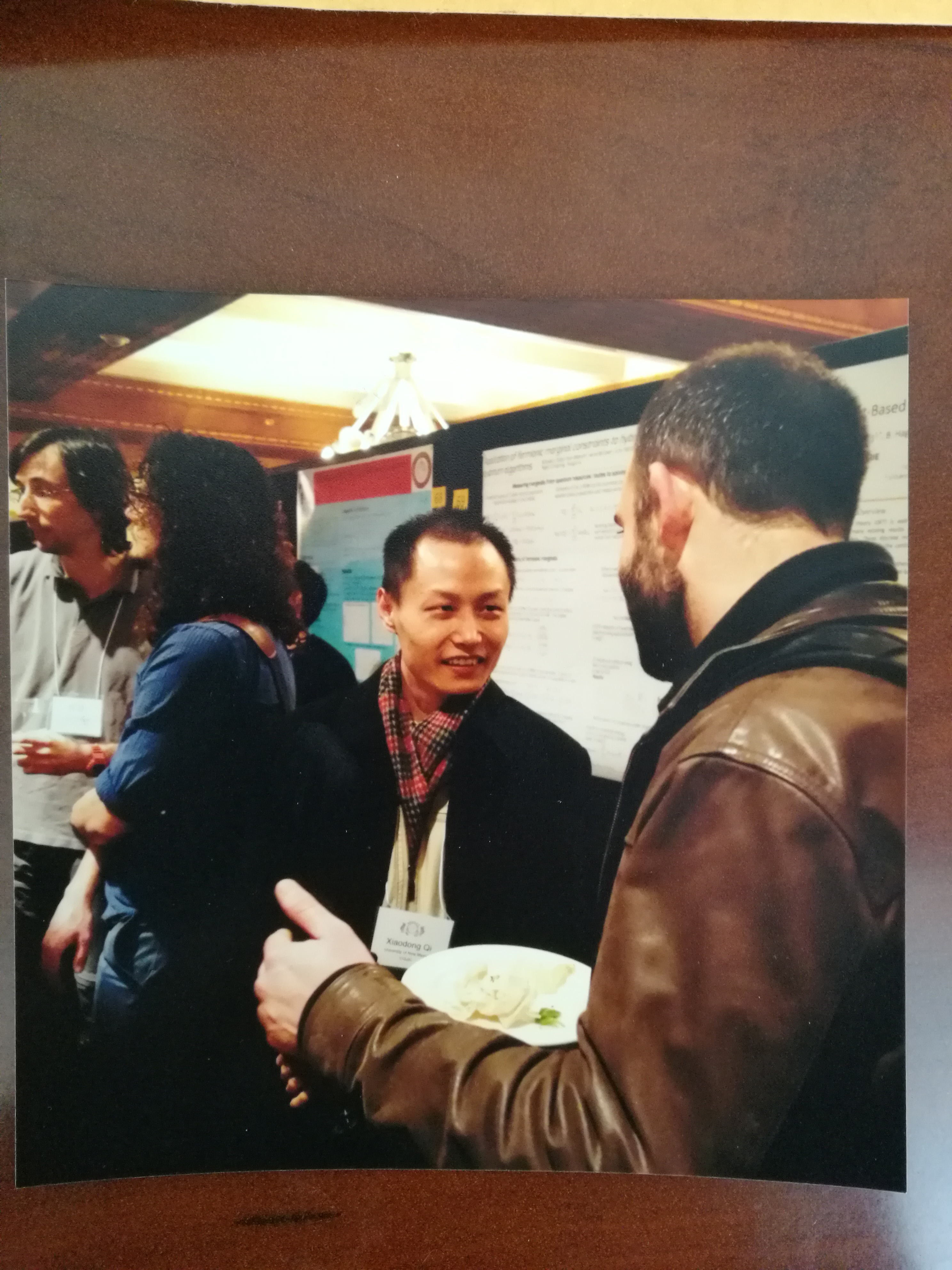 Chat with researchers during the poster session. Thank Leanne for taking the photo.